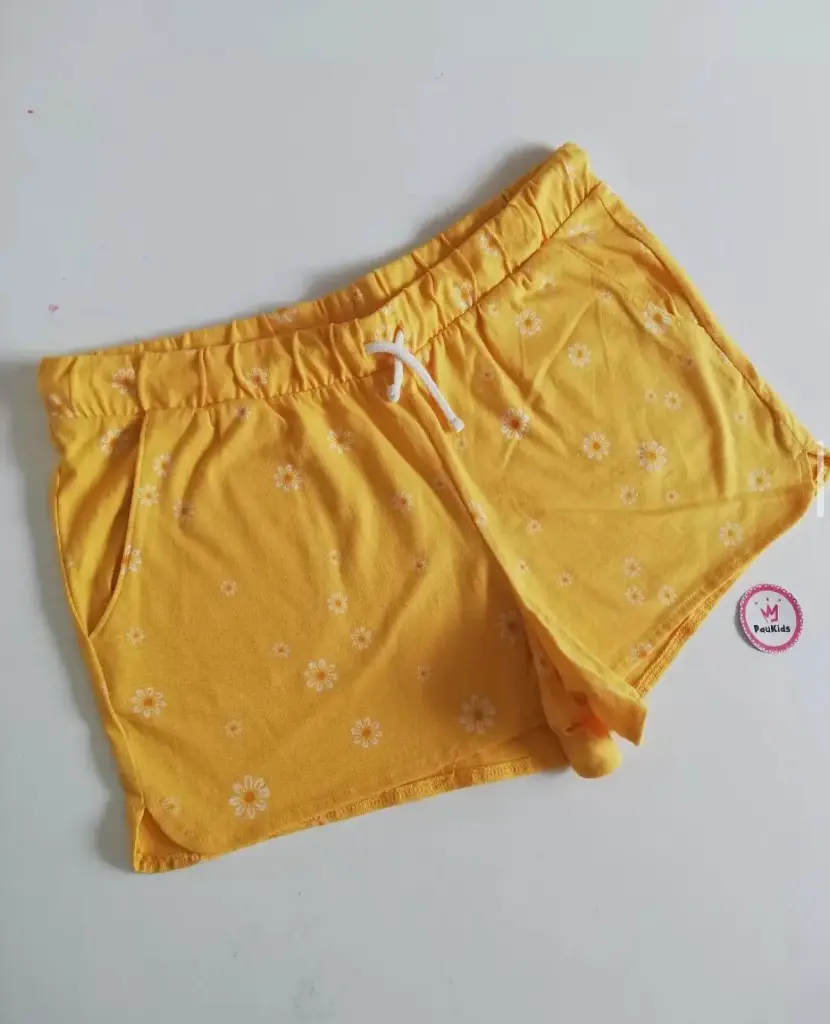 Short de tela amarillo flores